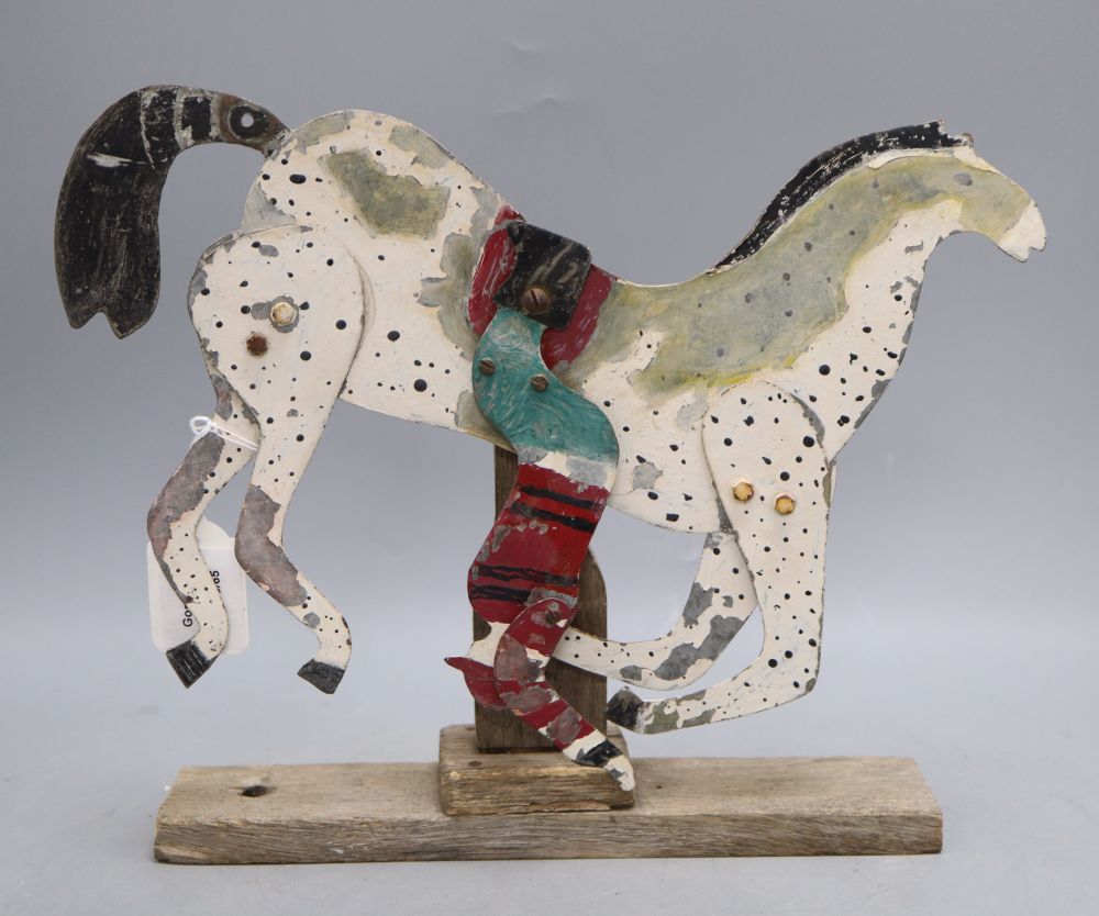 A tin model articulated horse and jockey, c.1990, width 36cm